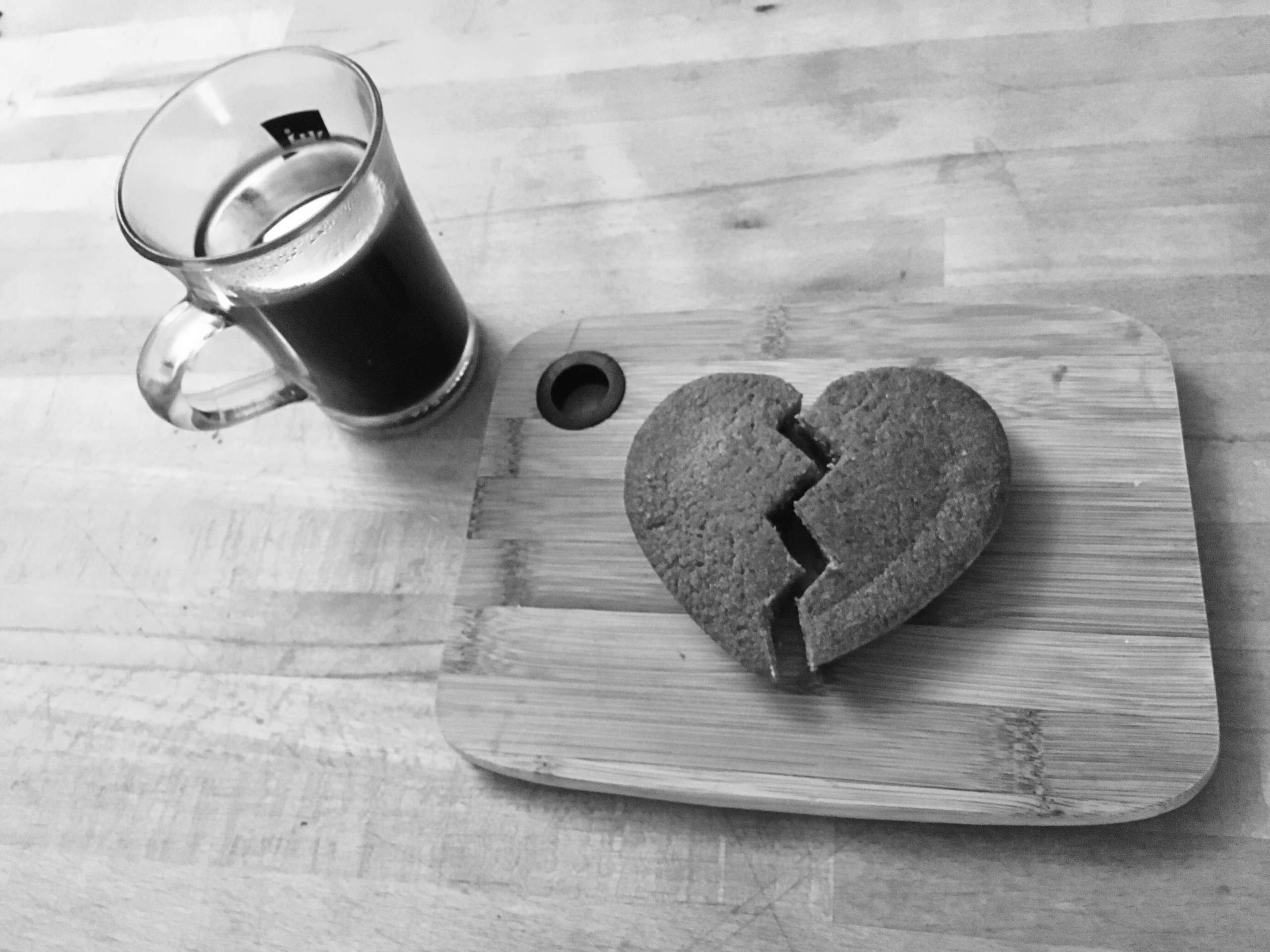 high-angle-view-heart-shape-cookie-by-coffee-table
